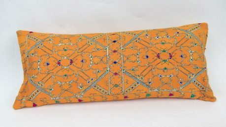 Rectangular, hand-embroidered cushion - predominantly orange with intricate patterns