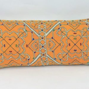 Rectangular, hand-embroidered cushion - mainly yellow with intricate jewel coloured chevrons