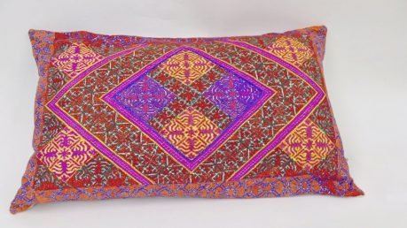 Rectangular, hand-embroidered cushion - red/pink/yellow - with large hot pink centred diamond